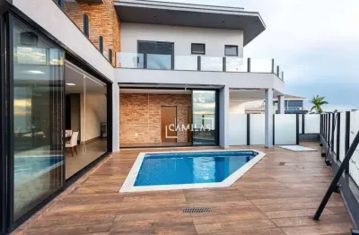 Casa com 4 dormitórios à venda, 280 m² por r$ 2.100.000,00 - condomínio residencial terras do cancioneiro - paulínia/sp