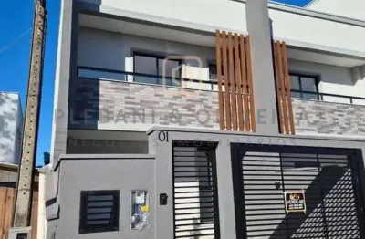 Sobrado com 3 dormitórios sendo 01 suíte à venda, 104 m² por R$ 639.500 - Gravatá - Navegantes/SC