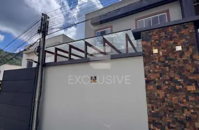 Casa com 2 dormitórios à venda, 66 m² por R$ 590.000 - Sitio São Luiz - Nova Friburgo - RJ