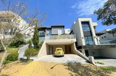 Casa em condomínio para venda com 4 quartos, sendo 4 suítes, 320m²