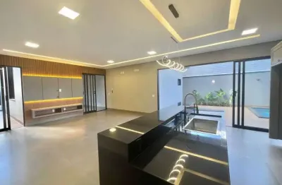Casa à venda com espaço extremamente amplo, 3 suítes, churrasqueira, piscina e armários em rio verde