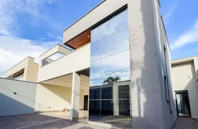 Casa à venda com churrasqueira, piscina, armários embutidos, 4 suítes e espaço amplo em rio verde