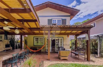 Casa  à venda com 4 quartos, sendo 2 suítes,  no condomínio carmel (sp ii), cotia - sp