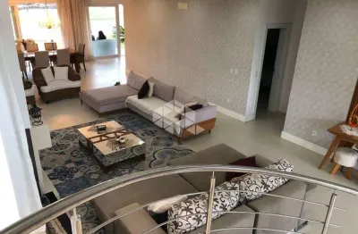 Casa em condomínio fechado com 5 quartos à venda na avenida jaçanã, 951, villagio atlântida, xangri-lá por r$ 5.980.000