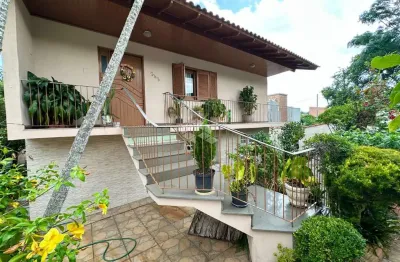 Casa com 5 quartos à venda na rua júlio finkler primo, 242, olaria, canoas por r$ 840.000