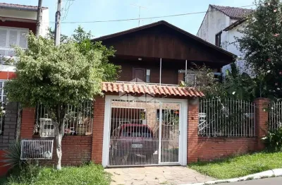 Casa com 4 quartos à venda na avenida doutor sezefredo azambuja vieira, 5729, olaria, canoas por r$ 640.000