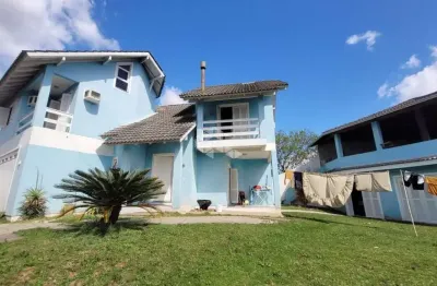 Casa em condomínio fechado com 4 quartos à venda na rua acácias, 161, feitoria, são leopoldo por r$ 900.000