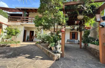 Casa com 3 quartos à venda na rua tramandai, 95, estância velha, canoas por r$ 870.000