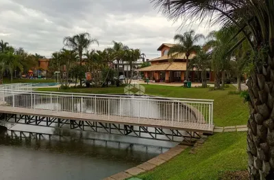 Terreno em condomínio fechado à venda na avenida açucena, 50, estância velha, canoas por r$ 1.270.000