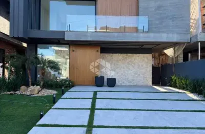 Casa em condomínio fechado com 4 quartos à venda na rua rio camisas, 101, remanso, xangri-lá por r$ 2.660.000
