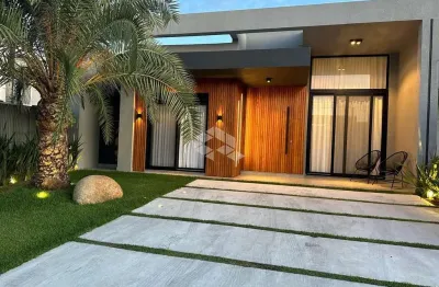 Casa em condomínio fechado com 4 quartos à venda na rua rio divisa, 231, remanso, xangri-lá por r$ 1.690.000