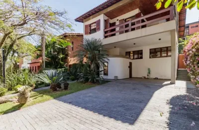 Casa em condomínio à venda com 4 quartos, sendo 3 suítes e 285m².