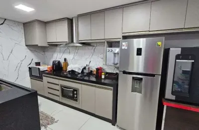 Casa 2/4 ampliada no condomínio rubi excelente localização.