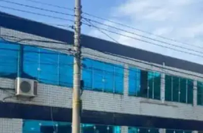 Prédio comercial à venda para para investidore 4 salas, 1 cozinha, galpão.