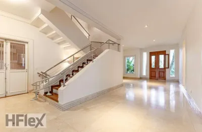 Casa em condomínio com  754 metros de área construída - jardim leonor