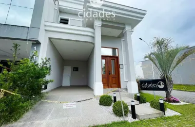 Casa com 3 dormitórios e suite em condomínio fechado em biguaçu/sc