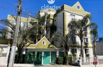 Aluguel apartamento semimobiliado de 2 dormitórios com garagem em são josé, serraria