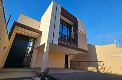 Casa jd. universitário com 230 mt2 área construída com piscina espaço gourmet foto voltaico,  3 suítes pé direito alto eliminação em led rebaixamento em gesso 4 vagas de garagens próximo lago igapó su