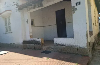 Oportunidade  casa frente de rua com terreno de 250 m2 varanda sala 3 quartos 3 garagens