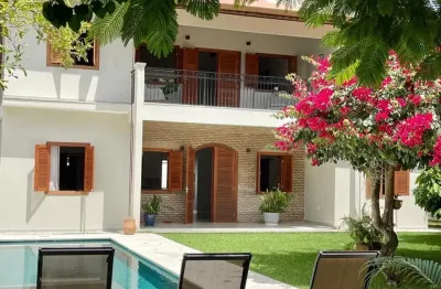 Casa de alto padrão à venda – 4 suítes | mobiliada | área gourmet | piscina | jardim