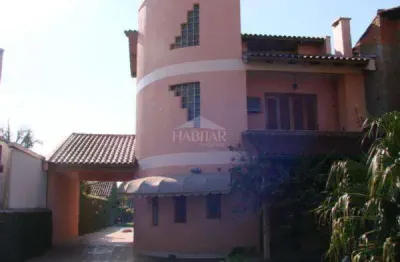 Casa sobrado à venda em canoas, fátima - com sacada e piscina