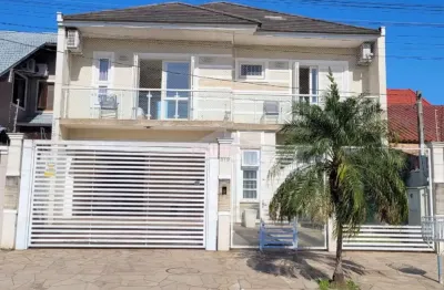 Casa à venda na Rua Andrômeda, 319, Moinhos De Vento, Canoas