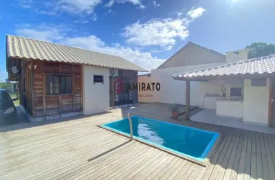 Casa à venda em arroio do sal com churrasqueira, piscina adulta e área de lazer