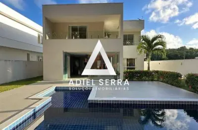 Alphaville litoral 3 - 4 quartos sendo 3 suítes - 2 lavabos - 4 vagas - piscina e área gourmet - sala ampla com pé direito duplo