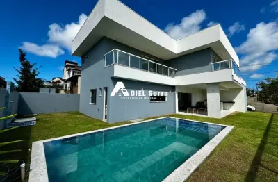 Alphaville litoral norte 2 - 415m² - porteira fechada - vista verde - 2 pavimentos - 4 suítes - piscina - espaço gourmet - armários - 3 vagas