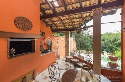 Casa em condomínio fechado com 3 quartos à venda na Rua Tocantins, 937, Lomba do Pinheiro, Porto Alegre