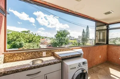 Apartamento com 3 quartos à venda na Rua Frederico Etzberger, 195, Nonoai, Porto Alegre