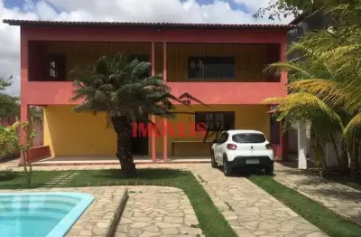 Casa a menos de 400 metros da praia de carapibus com 4 quartos.