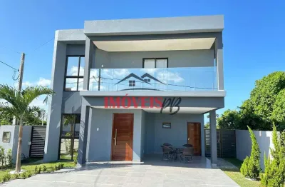 Casa em condomínio fechado , 04 quartos sendo 02 suítes e com vista mar