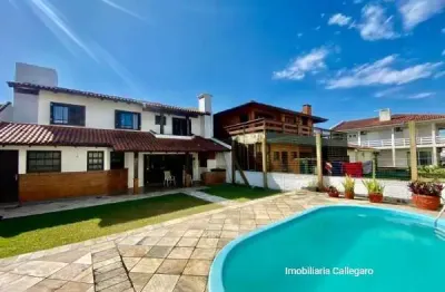 Casa com 4 quartos à venda na 03 de outubro, 03111, zona nova, tramandaí por r$ 690.000
