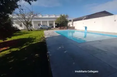 Casa com 4 quartos à venda na rua siqueira campos, 1135, tirolesa, tramandaí por r$ 1.728.000