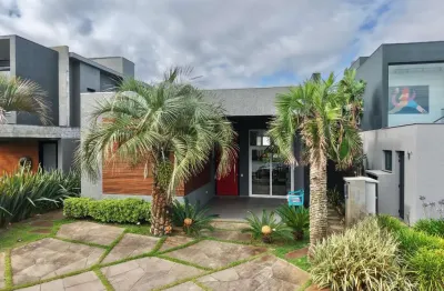 Casa em condomínio fechado com 4 quartos à venda na avenida paraguassu, 130, marina, xangri-lá por r$ 1.540.000