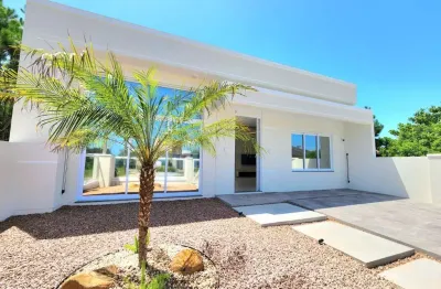 Casa com 3 quartos à venda na das rosas, 757, capão novo, capão da canoa por r$ 890.000
