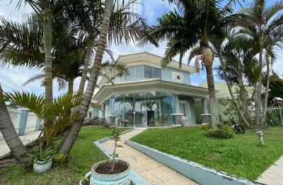 Casa com 3 quartos à venda na flavio boianowski, 892, centro, capão da canoa por r$ 1.770.000