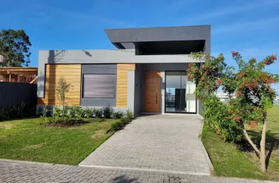 Casa em condomínio fechado com 4 quartos à venda na rua rio camisas, 10, centro, xangri-lá, 150 m2 por r$ 1.550.000