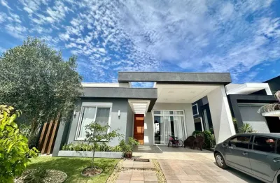 Casa em condomínio fechado com 4 quartos à venda na rua onório germano, 2009, condomínio dubai resort, capão da canoa por r$ 1.700.000