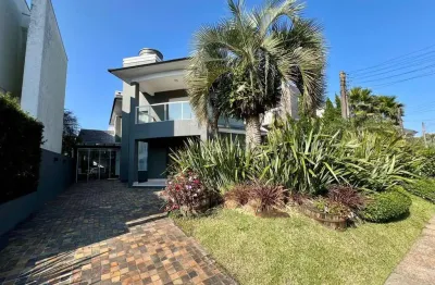 Casa em condomínio fechado com 4 quartos à venda na central, 2000, zona nova, capão da canoa, 380 m2 por r$ 3.000.000