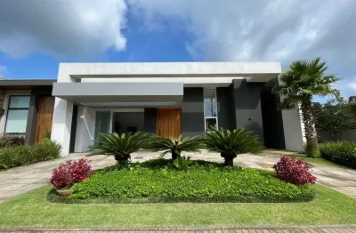 Casa em condomínio fechado com 4 quartos à venda na rua andira, km 35, velas da marina, capão da canoa por r$ 3.290.000