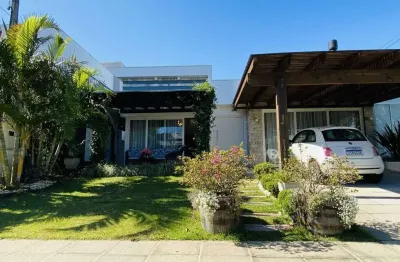 Casa em condomínio fechado com 3 quartos à venda na rua andira, 2000, zona nova, capão da canoa, 150 m2 por r$ 2.290.000