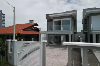 Casa com 3 quartos à venda na rua andira, 367, zona nova, capão da canoa por r$ 1.150.000