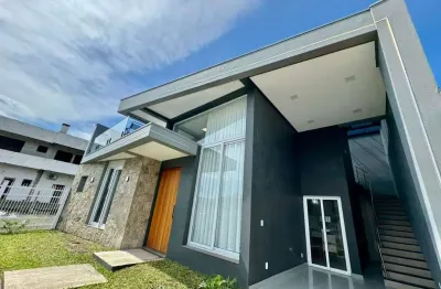 Casa com 3 quartos à venda na rua andira, 522, araça, capão da canoa por r$ 1.190.000