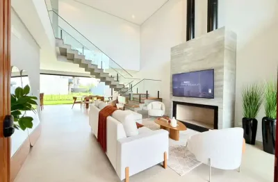 Casa em condomínio fechado com 4 quartos à venda na rua rio camisas, 10, centro, xangri-lá por r$ 2.390.000