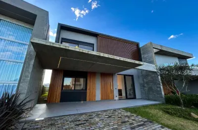 Casa em condomínio fechado com 4 quartos à venda na rua rio camisas, 10, centro, xangri-lá por r$ 2.590.000