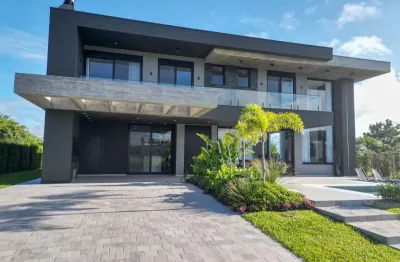 Casa em condomínio fechado com 4 quartos à venda na estrada do mar, km 20, atlântida sul (distrito), osório por r$ 4.500.000