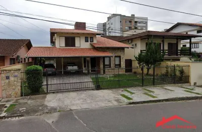 Casa com 3 dormitórios à venda, 286 m² por r$ 1.500.000,00 - costa e silva - joinville/sc
