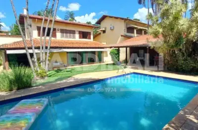 Encantadora casa à venda no bairro gramado, com um terreno de 1240 m² e área construída de 350 m².